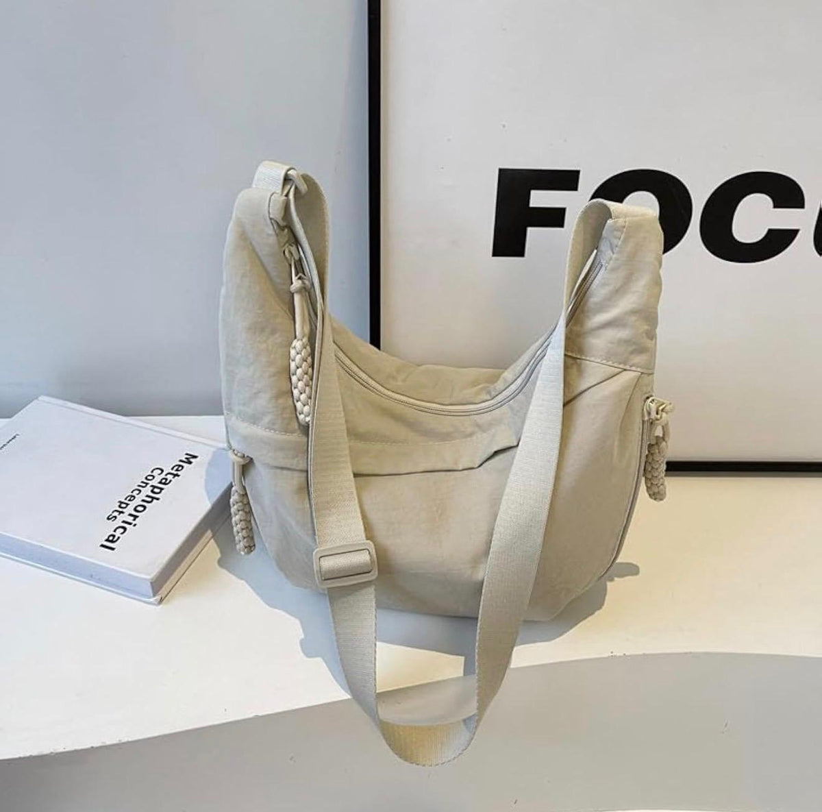 Nomi Crescent Crossbody Bag