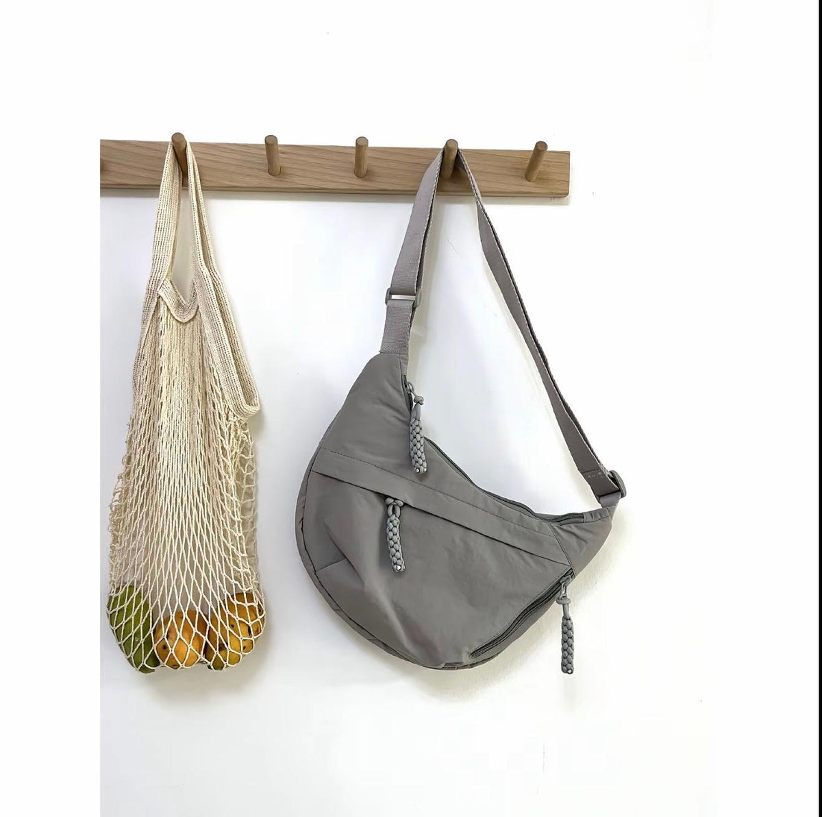 Nomi Crescent Crossbody Bag